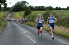 628 Ian Hudspith eventual winner and Matt Nicholson (both Morpeth Harriers) and Mark Hood (Sunderland) tucked in, already starting to move away from the bunch soon after the start of Tynedale 10k Road Race.